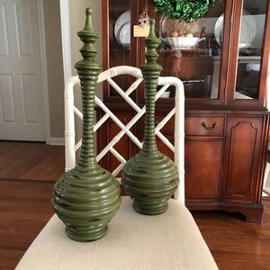 Pair of olive green decorative urns.
